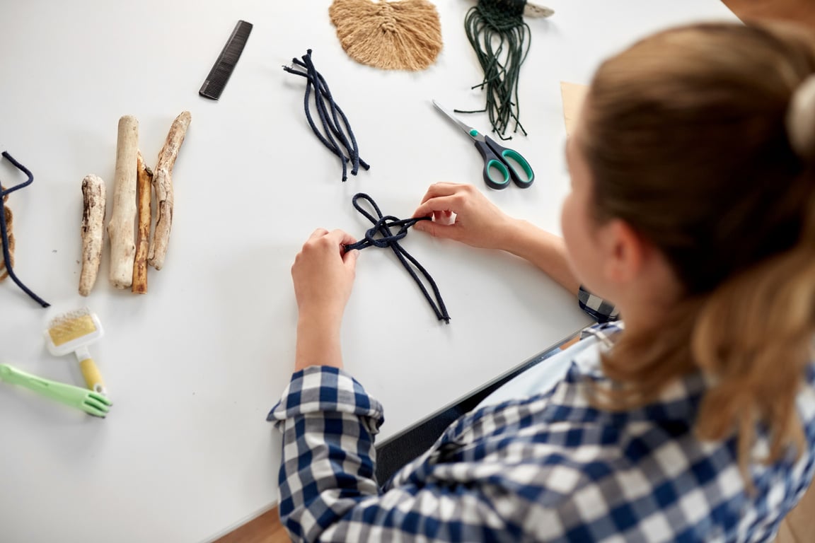 Woman Making Macrame and Knotting Cords